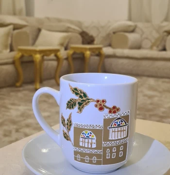 فنجان برسمه منزل